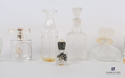 null Lot including eleven glass perfume bottles with stripes, ribs, flutes, plants,...