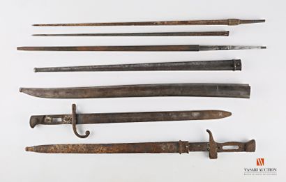 null Three Lebel bayonet blades, one Gras bayonet scabbard, one Chassepot bayonet...