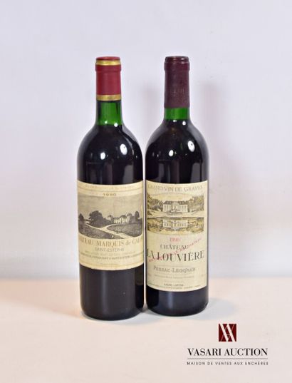 null Lot of 2 bottles including :

1 bottle Château MARQUIS DE CALON St Estèphe 1990

1...
