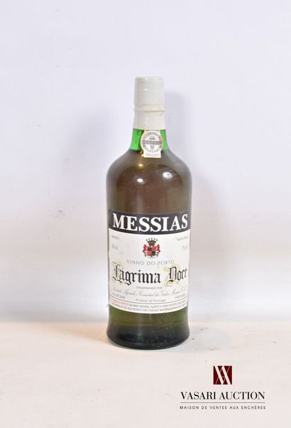 null 1 bouteille	Porto LAGRIMA DOCE mise Messias		

	75 cl - 20°. Et. un peu tachée....