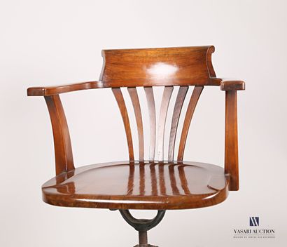 null Mahogany desk armchair, the curved back has six vertical fan-shaped bands, the...