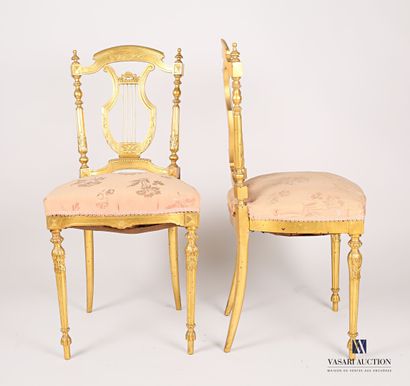 null Pair of moulded, carved and gilded natural wood music chairs, the backs in the...