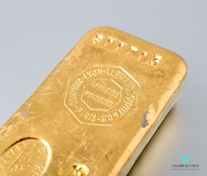 null Gold ingot n° 611.713 with its test report issued by the comptoir Lyon Allemand...