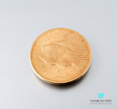 null Gold coin of 20 dollars type Saint Gaudens presenting on the obverse liberty...