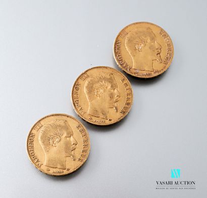 null Three 20-franc gold coins featuring Napoleon III bareheaded engraved by Albert-Désiré...