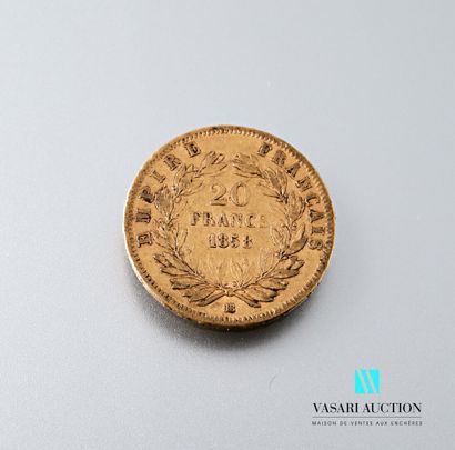 null A 20 franc gold coin featuring Napoleon III bareheaded engraved by Albert-Désiré...