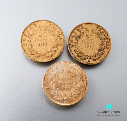 null Three 20-franc gold coins featuring Napoleon III bareheaded engraved by Albert-Désiré...