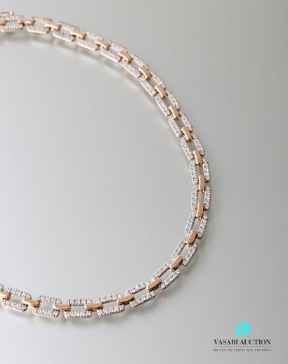  Flexible gold necklace 750 thousandths formed of rectangular links in white gold...