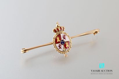 null Pin with nurse in yellow gold 750 thousandths decorated with an enamelled escutcheon...