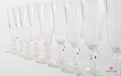 null Ten glass champagne flutes with gadroon decoration of two different models

Height...