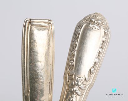 null Silver lot including an egg spoon in vermeil, the handle decorated with torch...