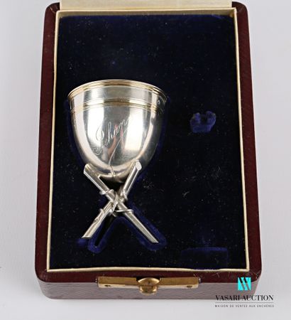 null Silver egg cup on a tripod base, marked Jehan and hemmed with a net on the body...