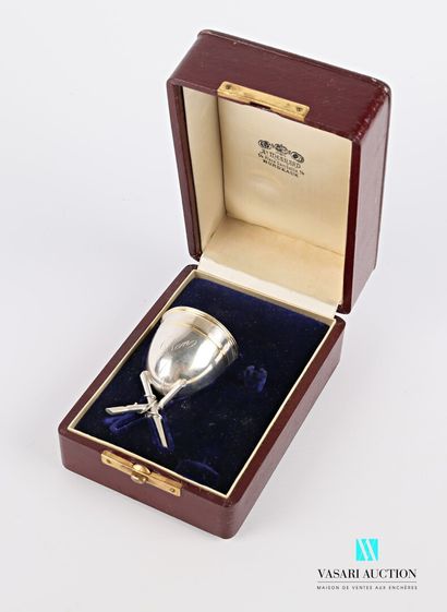 null Silver egg cup on a tripod base, marked Jehan and hemmed with a net on the body...