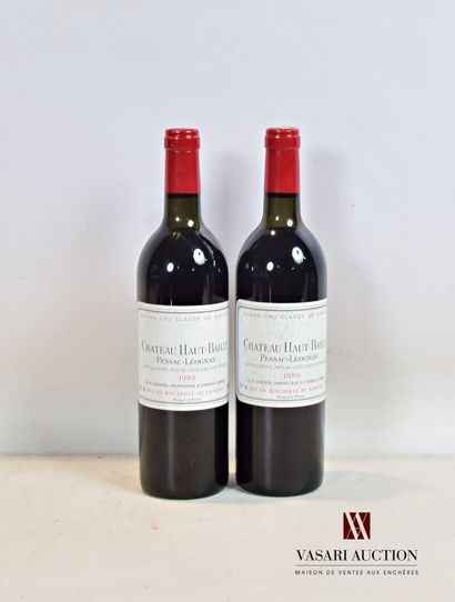 null 2 bouteilles	Château HAUT BAILLY	Graves GCC	1989

	Et. tachées. N : 1 tout en...