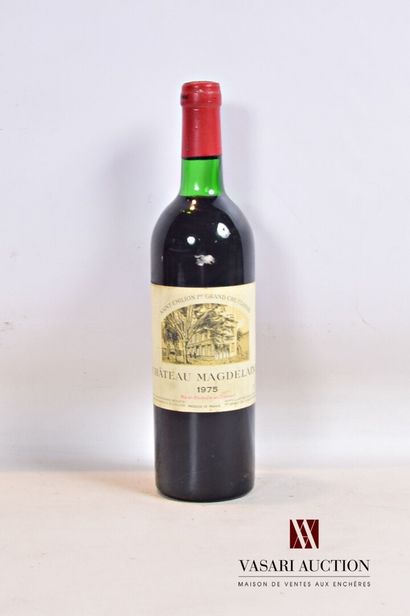 null 1 bouteille	Château MAGDELAINE	St Emilion 1er GCC	1975

	Et. tachée. N : limite...