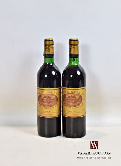 2 bouteilles	Château BATAILLEY	Pauillac GCC	1982

	Et....