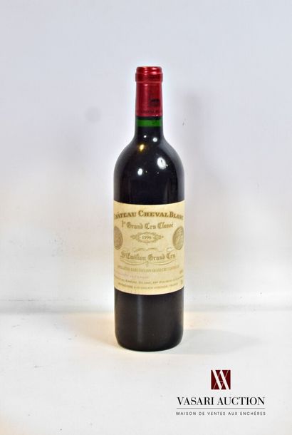 null 1 bouteille	Château CHEVAL BLANC	St Emilion 1er GCC	1996

	Et. tachée. N : mi...