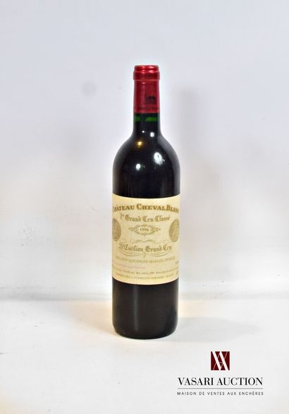 null 1 bouteille	Château CHEVAL BLANC	St Emilion 1er GCC	1996

	Et. tachée. N : haut...