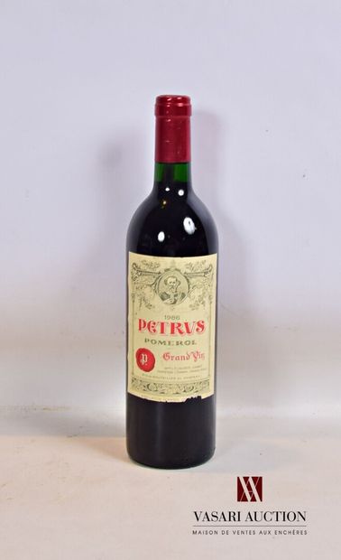null 1 bouteille	PÉTRUS	Pomerol 	1986

	Et. très légèrement tachée (un peu effrangée)....