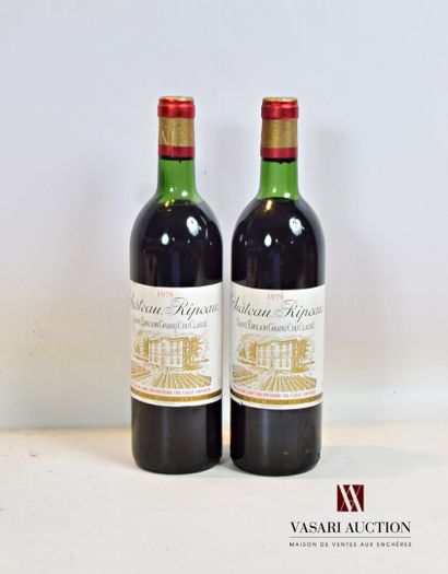 null 2 bouteilles	Château RIPEAU	St Emilion GCC	1979

	Et. un peu tachées. N : 1...