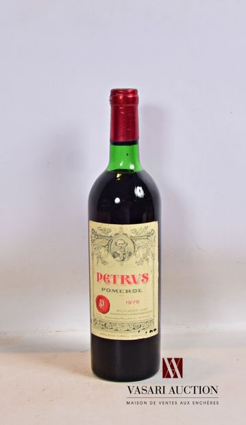 null 1 bouteille	PÉTRUS	Pomerol 	1975

	Et. légèrement tachée (un peu effrangée,...