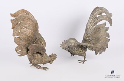 null Two subjects representing two fighting roosters in chased metal, marked and...