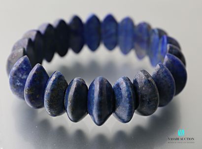 null Bracelet sur cordon élastique orné de côtes de melon en lapis lazuli

Diam....
