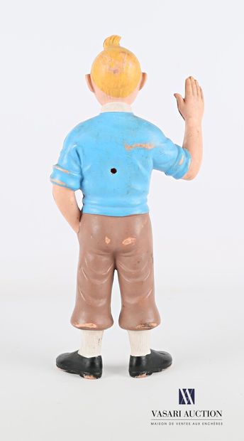 null Figurine Tintin la main levée en plastique moulé 

(usures et petit percement...