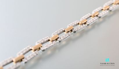 null Flexible bracelet in gold 750 thousandths, rectangular links in white gold paved...