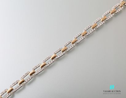 null Flexible bracelet in gold 750 thousandths, rectangular links in white gold paved...