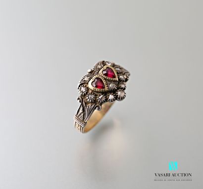 null A silver and gold ring of faith or Fede, the ring chased with flowers, the heart-shaped...