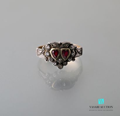 null A silver and gold ring of faith or Fede, the ring chased with flowers, the heart-shaped...