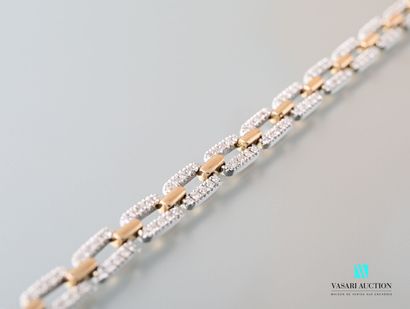 null Flexible bracelet in gold 750 thousandths, rectangular links in white gold paved...