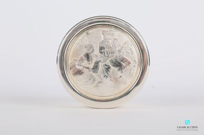 null Round box of silver plated metal, the lid decorated with a medallion showing...