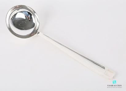 null Ladle in silver plated metal, the handle decorated with nets finished by a geometrical...