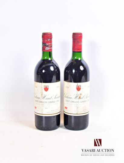 null 2 bouteilles	Château HAUT POURRET	St Emilion GC	1989

	Et. tachées. N : limite...
