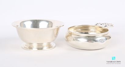 null A silver bowl and a cup, the first one of round form rests on a small pedestal,...