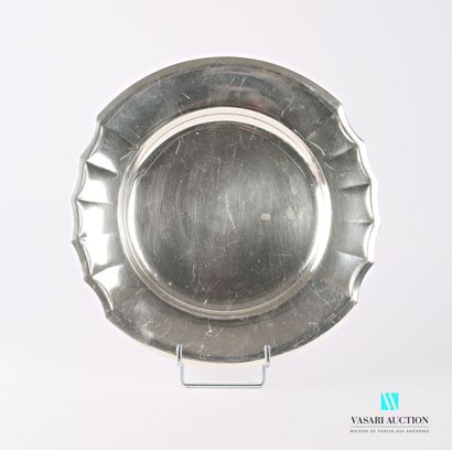 null Round and hollow dish, the edge partly crenellated with pinched ribs.

Diameter...