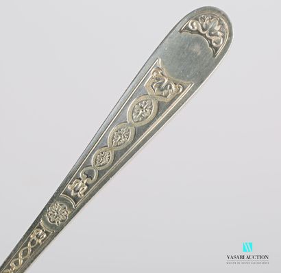 null Plate and its spoon in silver plated metal, the edge and the handle decorated...