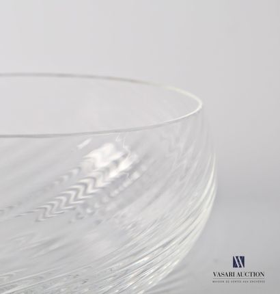 null Set of three ovoid bowls in translucent glass, the body hemmed with slight helical...
