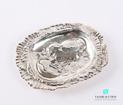 null A silvered bronze oval-shaped pouch, the basin presents a chick coming out of...