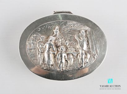 null Small oval silver box, the hinged lid decorated in relief with a market scene...