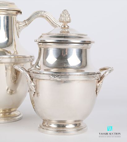 null Silver plated tea service, the fretel simulating a grain fruit, the handles...