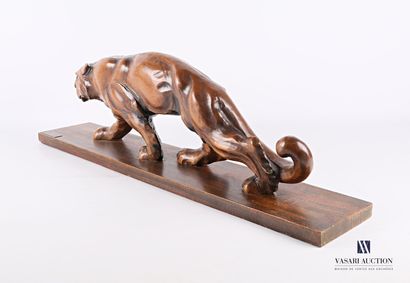 null F. LIER (20th century)

Panther walking in carved wood 

Signed on the base...