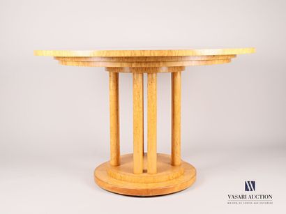 null Maple and maple veneer dining table, the top round in shape, the leg with eight...
