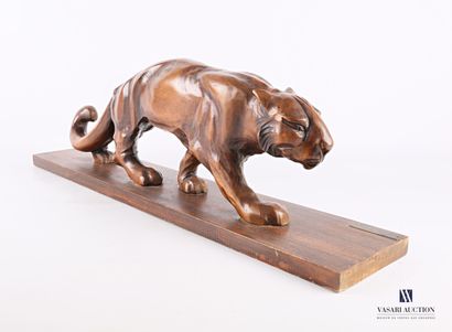 null F. LIER (20th century)

Panther walking in carved wood 

Signed on the base...