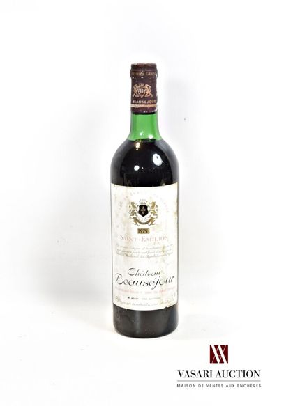 null 1 bouteilles	Château BEAUSÉJOUR	St Emilion 1er GCC	1975

	Et. tachée. N : tout...