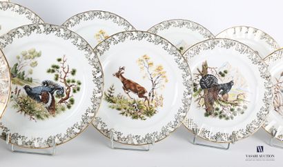 null LIMOGES

White porcelain dinner service with polychrome decoration of animals...