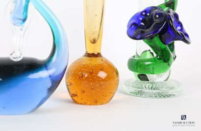 null Lot in blown glass including a subject representing a swan tinted blue and green...