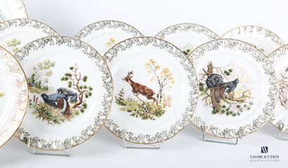 null LIMOGES

White porcelain dinner service with polychrome decoration of animals...